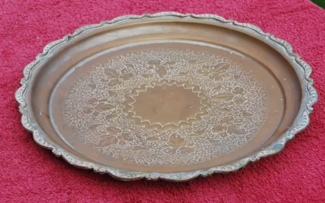 Embossed or impressed brass tray large plate 12 1/2 inches across