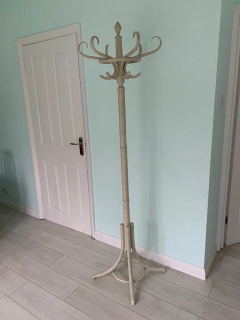 Cream wooden coat shop stand