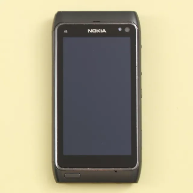 The legendary Nokia 3210, Nokia's very first mobile phone without an  external antenna. This one sports a more unusual, red housing instead of  the standard dark grey one. The original colored covers