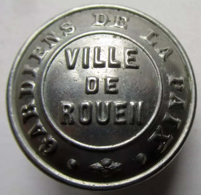 Bouton bombé en métal argenté du 19è Gardiens de la paix / Ville de Rouen 21 mm