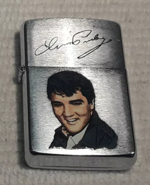 Zippo lighter with Elvis Presley portrait and signature GUC no box USA collector
