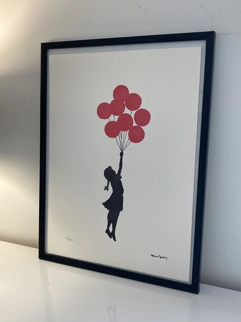 lithographie banksy avec certificat et encadrée