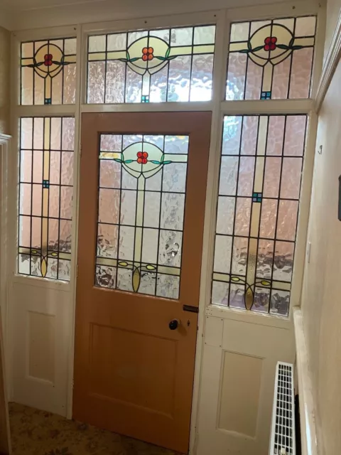 Stained glass door with frame, top and side panels