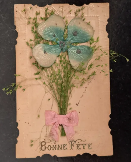 CPA Fantaisie gaufrée 1900 ajoutis Trèfle à 4 feuilles (tulle) herbage et nœud