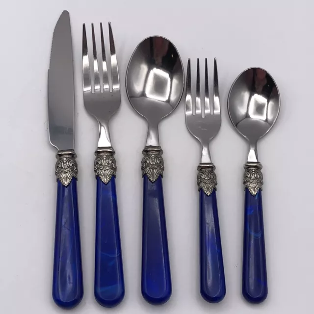 https://www.picclickimg.com/FZkAAOSw2dxj0KvT/Stainless-Flatware-Set-With-Blue-Marbled-Acrylic-Handles.webp