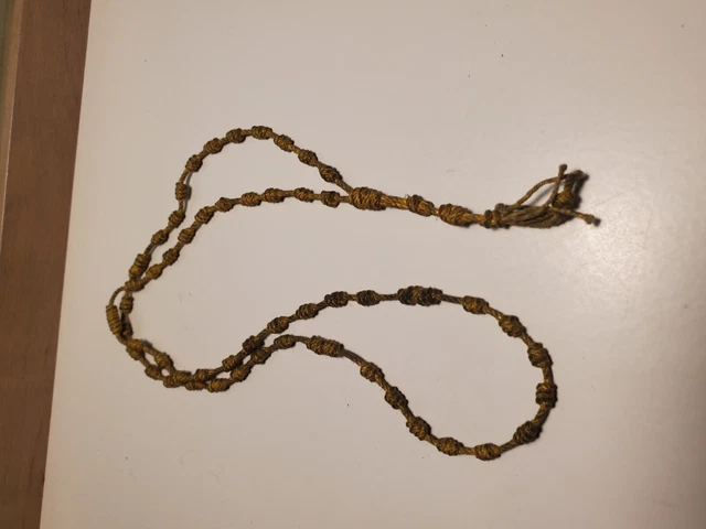 Rosario católico anudado vintage.