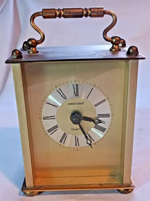 VINTAGE German made ANGLIQUE  quartz carriage clock working well slight tarnish.