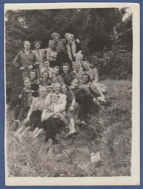 Beautiful guys with girls in nature, happy group of people Vintage Photo USSR