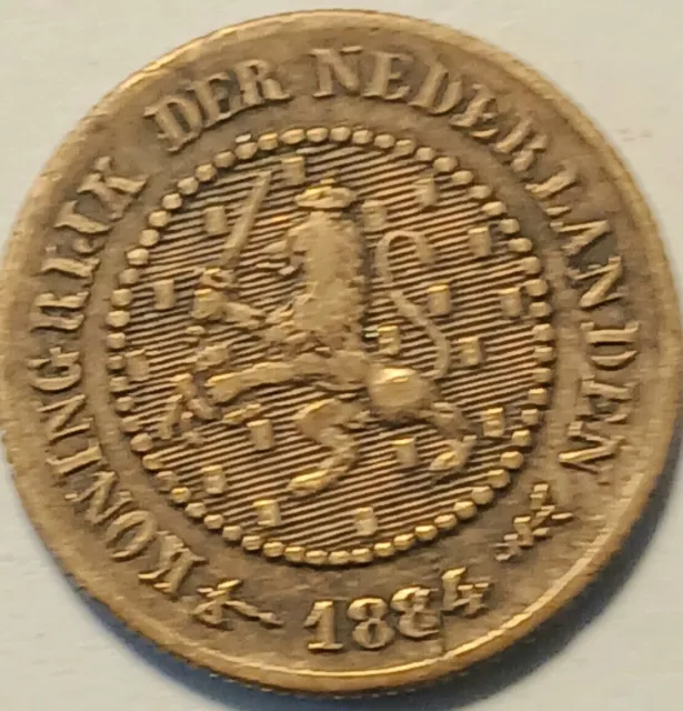 1884 1/2 cent Nederlanden coin  very nice coin and very small about 1/2 in