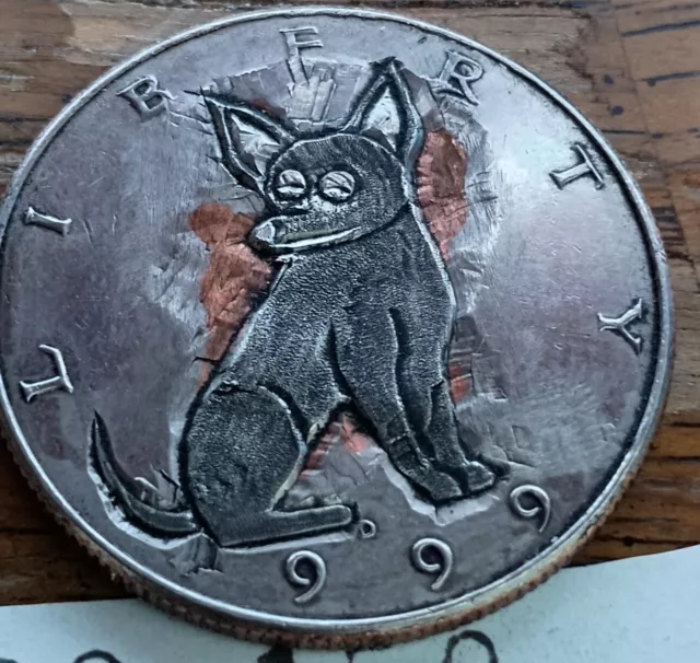 The Dog Hobo Nickel Hand Carved Into A Half Dollar