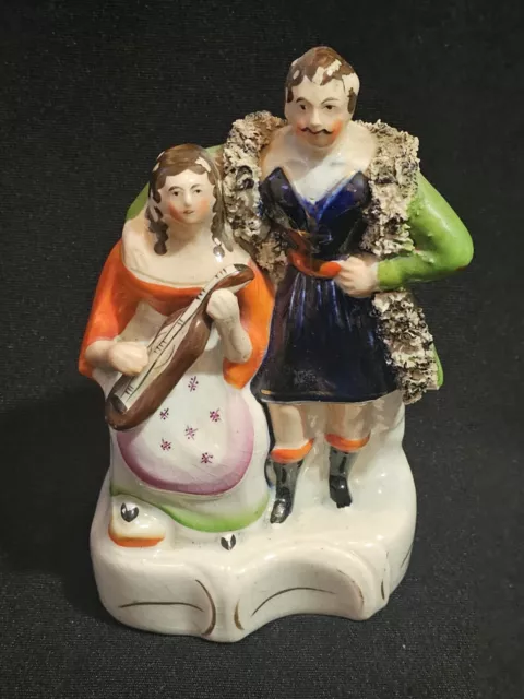 An Antique Early Victorian Staffordshire Figure Group of Male & Female Actors