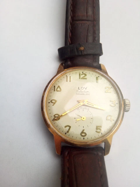 Montre vintage , LOV , MECANIQUE , ne Fonctionne pas