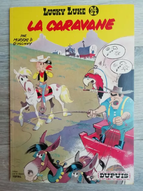 BD Souple Lucky Luke N°24 La Caravane Pub Total éd. Dupuis 1972