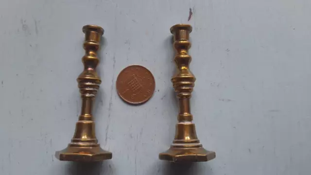 Pair of miniature brass candlesticks