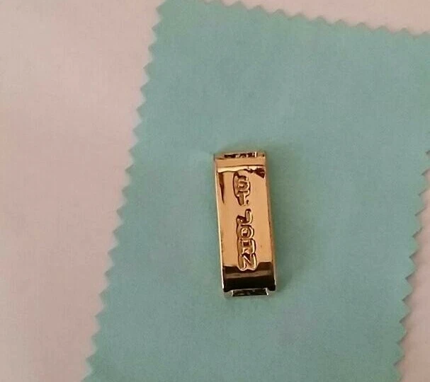 Conector de decoración tono dorado St john rana
