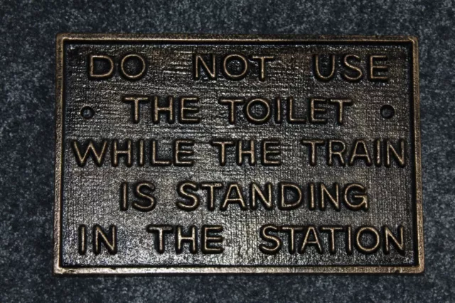 Cast Metal Do Not Use The Toilet While The Train...