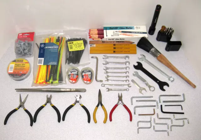 Junk drawer lot garage tools Coast flashlight Stanley cutters pliers wrenches