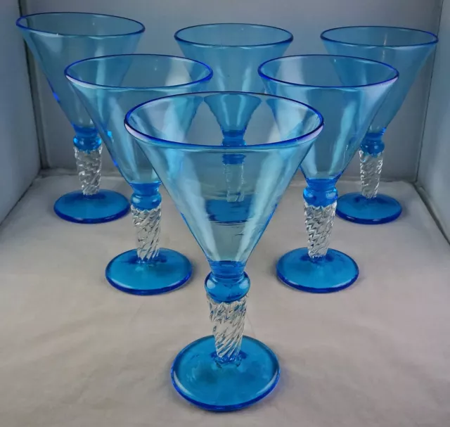 https://www.picclickimg.com/FmcAAOSwtvNkeNAJ/Six-Signed-Rick-Strini-Art-Glass-Blue-Wine.webp