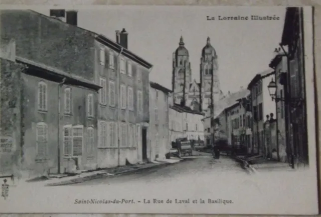 CPA.Saint Nicolas du Port, la rue de Laval et la basilique