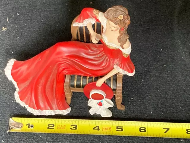 The Drink of Daydreams Lady Figurine – Relaxing Moments with Coca Cola