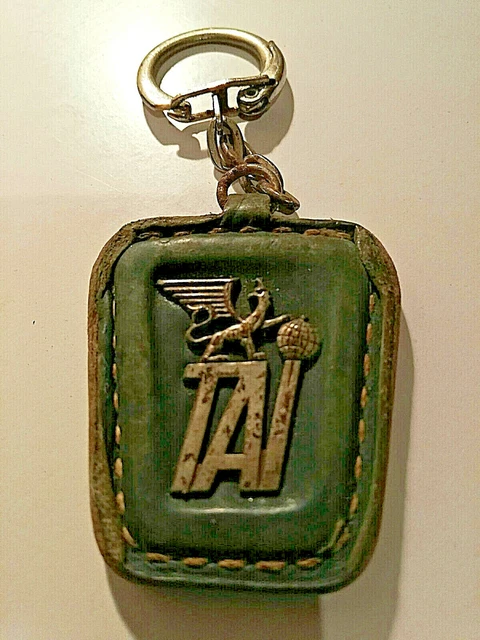 porte clé publicitaire -  TAI (TRANSPORTS AERIENS INTERCONTINENTAUX) 1946/1963