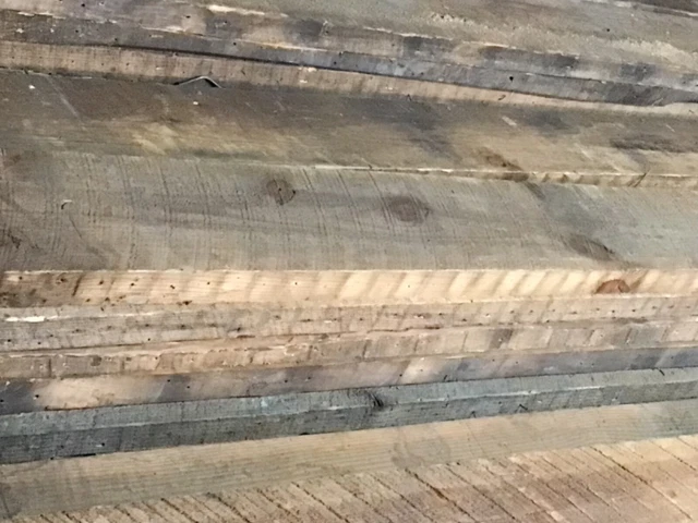 used old ruff cut 2×7 an1/2 ×16 or 18 foot long straight barn boards. An 2x12x18