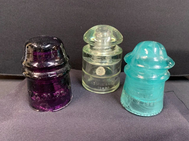 3 Telegraph Insulators Hemingray  Clear and Milky Aqua No. 9 and W.G.M  Purple