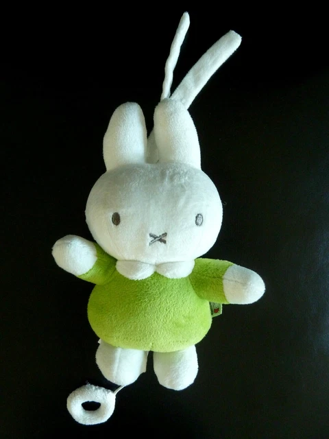 84. DOUDOU PELUCHE MUSICAL MIFFY AMIE DE KITTY LAPIN BLANC VERT 23 cms TTBE