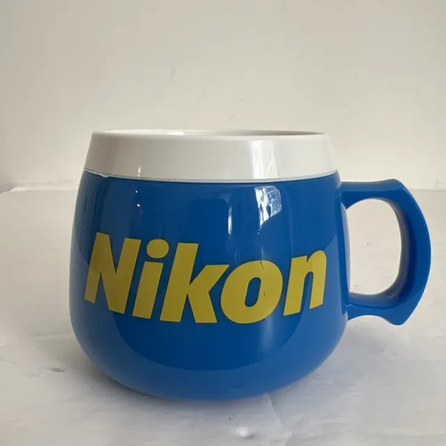 Vintage Nikon Mug Thermal Plastic Weighted Base Blue Yellow Logo Made in USA EUC