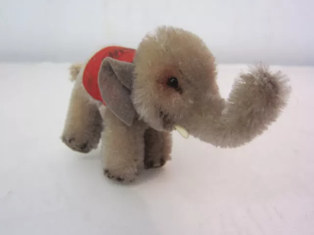 e13)Steiff Elefant 6307/0,grau,rote Satteldecke,Mohairpluesch,Knopf&Fahne erh.