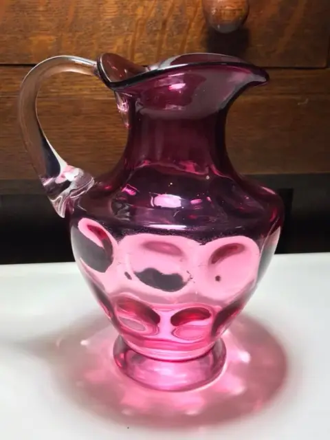 Inverted Thumbprint cranberry glass pitcher