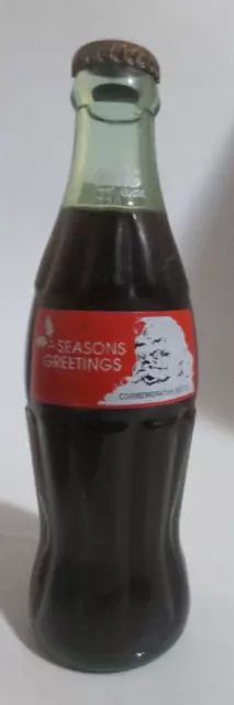 Coca-Cola Classic Season Greetings Santa Claus 8oz full 1981