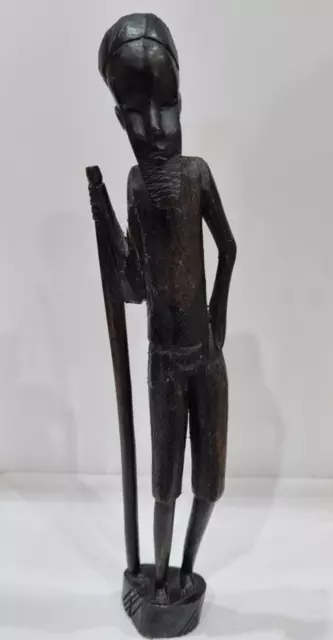Antique African man and stick hand carved wooden teakwood statue