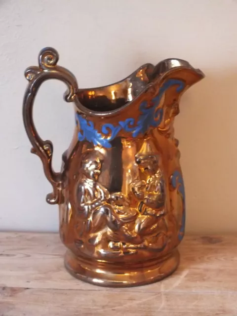 Pichet ancien en faïence de Jersey - décor en relief