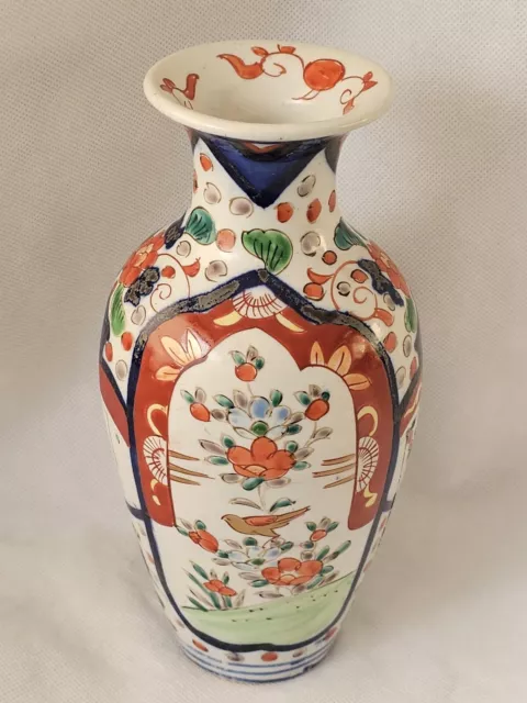 An Antique Japanese Imari Vase, Hand Painted in Traditional Colours