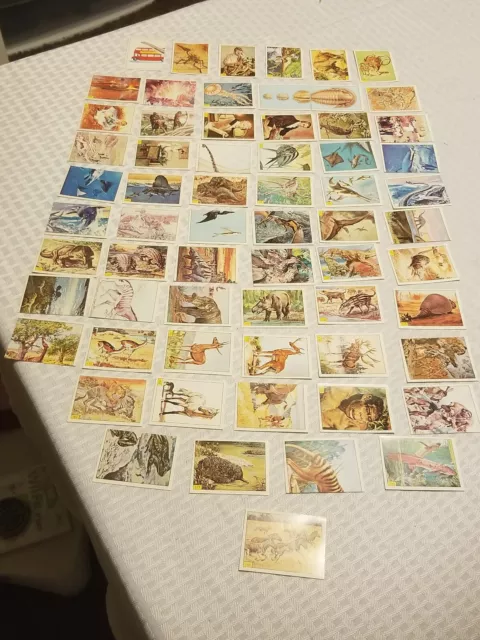 1986 Panini "Dinosaurs: Prehistoric Animals" Lot of 64 Individual Stickers, NOS