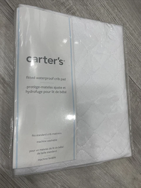 Nuevo colchón protector Carters impermeable acolchado cuna y niño pequeño