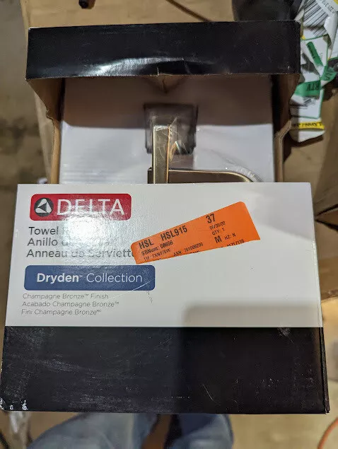 ​Delta 75146-CZ Dryden Open Towel Ring in Champagne Bronze