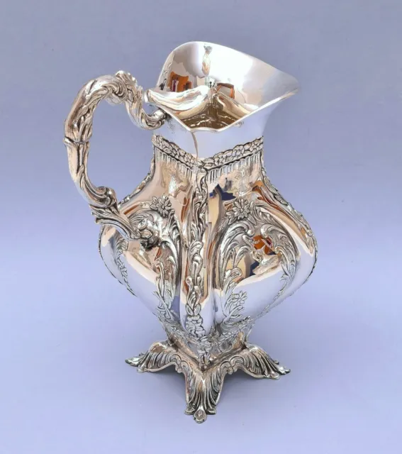 Beautiful Solid Silver Pitcher With Repousse Decoration In Very Good Condition