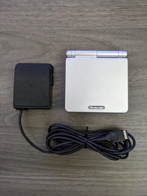 Nintendo Game Boy Advance SP Silver AGS-001 Handheld Console TESTED AND WORKING Nintendo Game Boy Advance SP Silver AGS-001 Handheld Console TESTED AND WORKING
