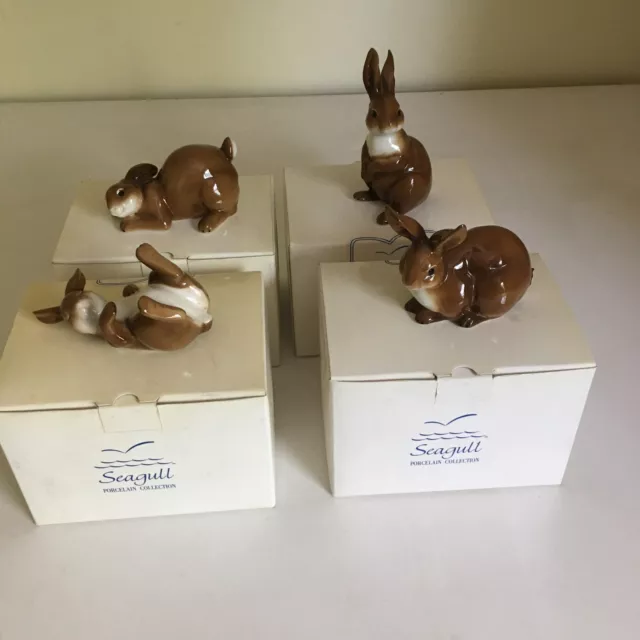 4 Porcelain Rabbit Figurines-Seagull Collection