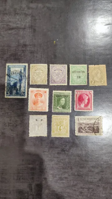 Timbres du Luxembourg. Lot de 11 timbres anciens. Oblitérés en partie.