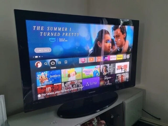 Tv with built shop in swivel base