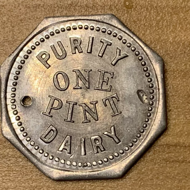 Purity Dairy Milk Token. Good For One Pint Coin.  *U206