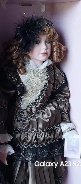 Collectors choice Porcelain Memories, doll green eyes brown hair