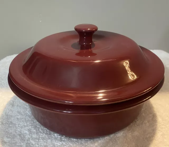 https://www.picclickimg.com/Fz4AAOSwr01lhhfg/Pampered-Chef-1132-Round-Covered-Baker-Cranberry-Stoneware.webp