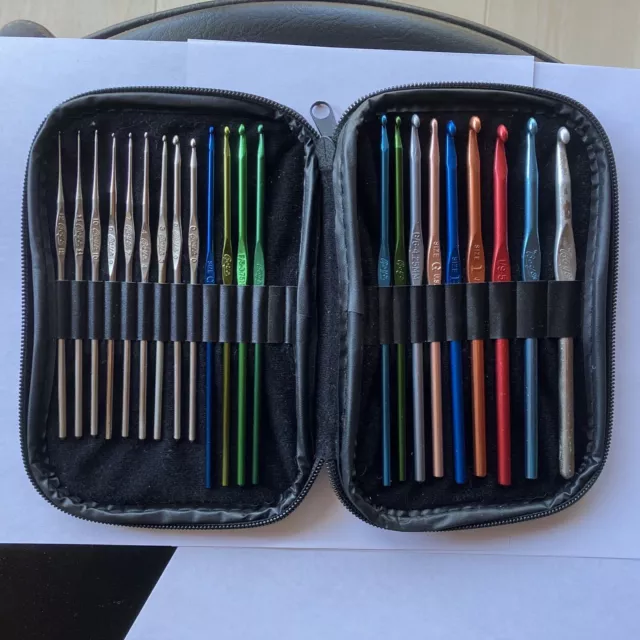 Boye USA Crochet hooks in pink leatherette case, lot of 22 vintage Boye U.S.A. Boye USA Crochet hooks in pink leatherette case, lot of 22 vintage Boye U.S.A.