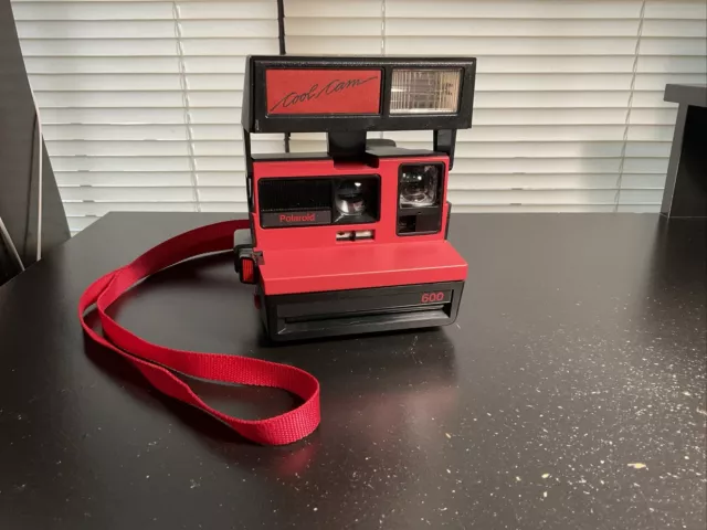 Polaroid Red & Black Cool Cam 600. Works Fine. Busted Strap.