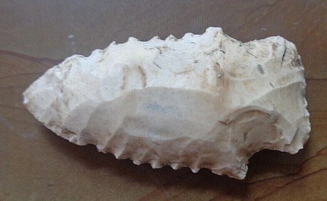 fine old serrated white stone arrow head  point
