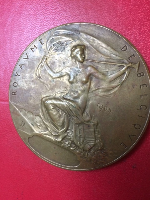 Médaille en bronze de l'Exposition Universelle de Bruxelles 1910, gravée par G. Devrees - Enchères Luxembourg